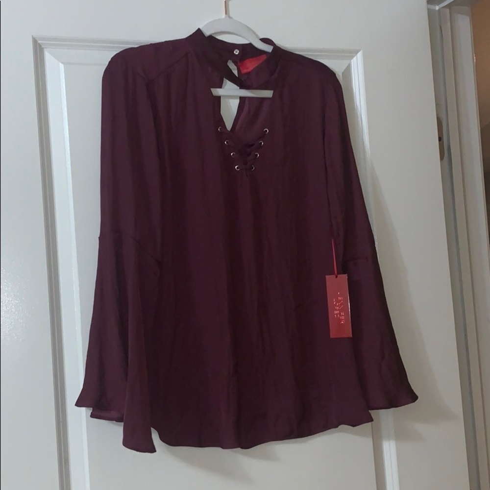 Jennifer Lopez lace up choker blouse